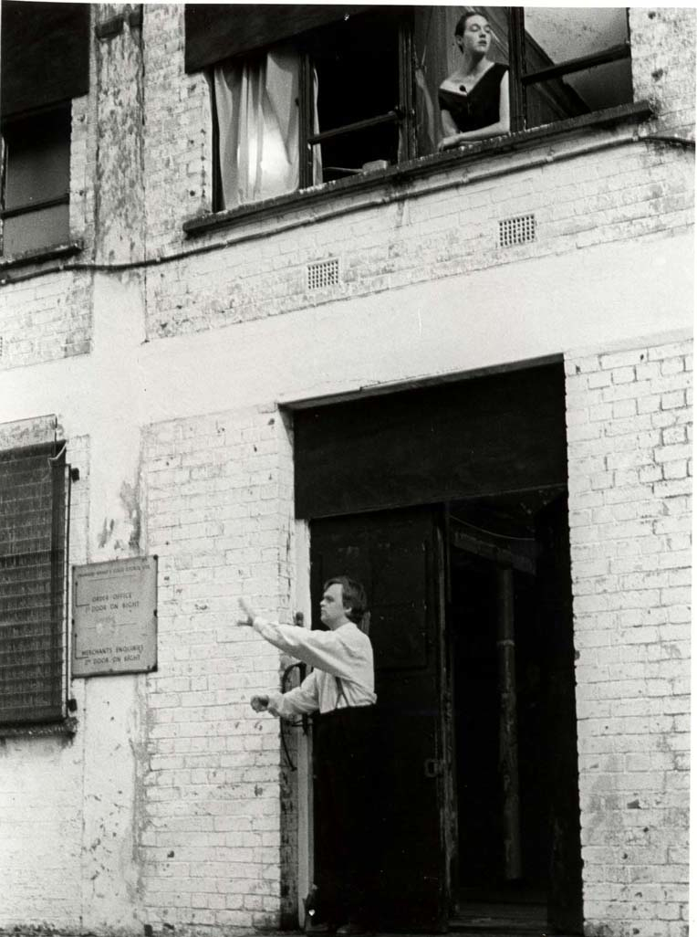 Black & white photograph of site specific performance 9 Windows 1997